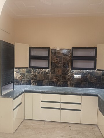Kitchen in 3 BHK Builder Floor at Dhakoli Village – for Sale