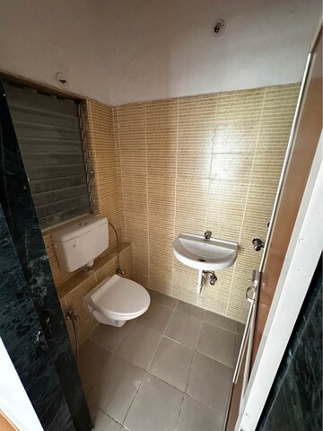 Bathroom in 1 BHK Apartment at JSB Nakshatra Greens, Naigaon East – for Rent