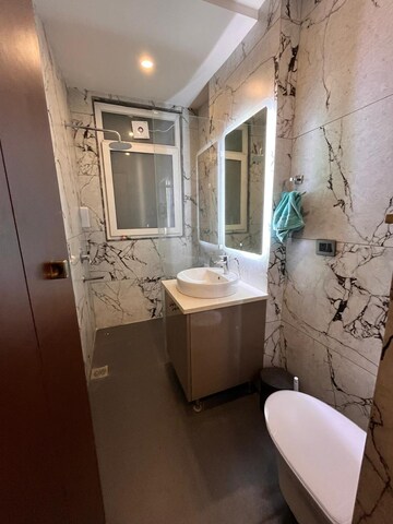 Bathroom in 3 BHK Apartment at Emaar Emerald Estate, Sector 65 – for Rent