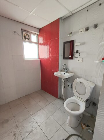 Bathroom in 4 BHK Apartment at Antriksh Golf View, Sector 78 – for Rent