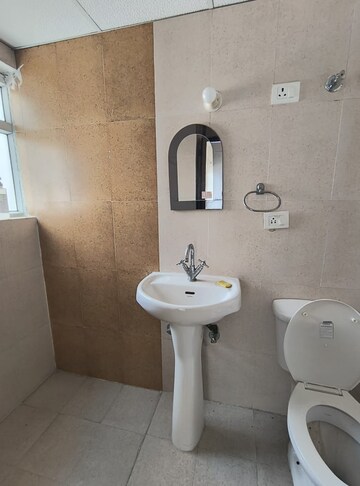 Bathroom in 4 BHK Apartment at Antriksh Golf View, Sector 78 – for Rent
