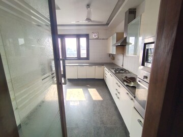 Kitchen in 4 BHK Apartment at South Extension ii – for Sale