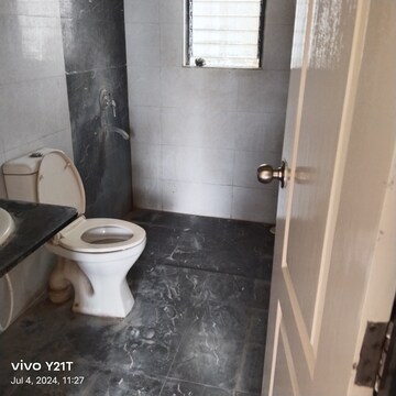 Bathroom in 2 BHK Apartment at Kolte Patil Margosa Heights, Mohammadwadi – for Rent