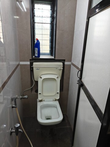 Bathroom in 1 BHK Apartment at Krupa CHS, Mulund East – for Rent