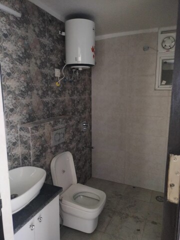 Bathroom in 3 BHK Apartment at Sushma Crescent, Dhakoli Village – for Rent