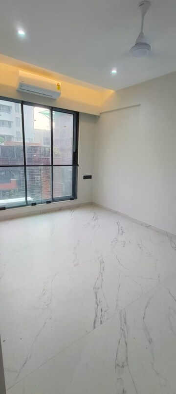 Room in 2 BHK Apartment at Rishabraj Blue Lotus, Khar West – for Rent