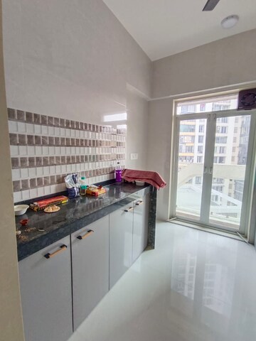 Kitchen in 1 BHK Apartment at JVM Corner Stone, Naupada – for Sale