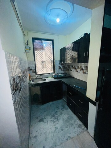 Kitchen in 1.5 BHK Builder Floor at Rohini Sector 24 – for Rent