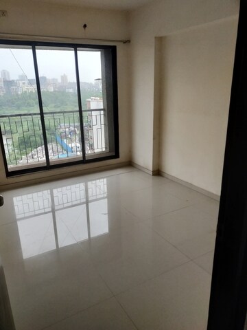 Room in 2 BHK Apartment at Raunak City Sector 4, Kalyan West – for Sale
