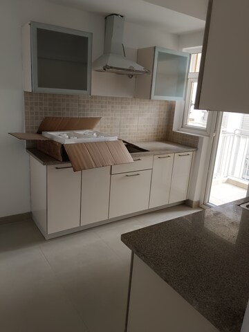 Kitchen in 3 BHK Apartment at Emaar Gurgaon Greens, Sector 102 – for Rent