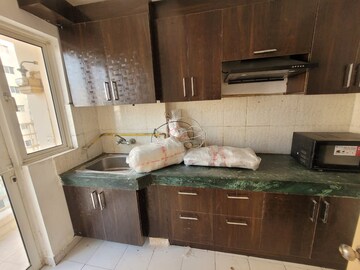 Kitchen in 2 BHK Apartment at Paras Tierea, Sector 137 – for Rent