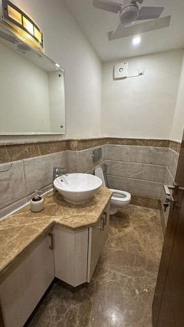 Bathroom in 3 BHK Apartment at Defence Colony – for Rent