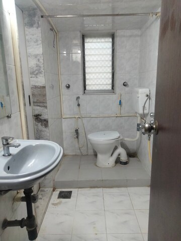 Bathroom in 2 BHK Apartment at Parag Mansion Chs , Andheri West – for Rent