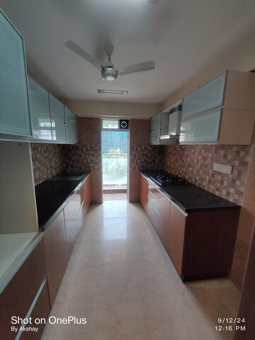 Kitchen in 2 BHK Apartment at Rustomjee Paramount, Khar West – for Rent