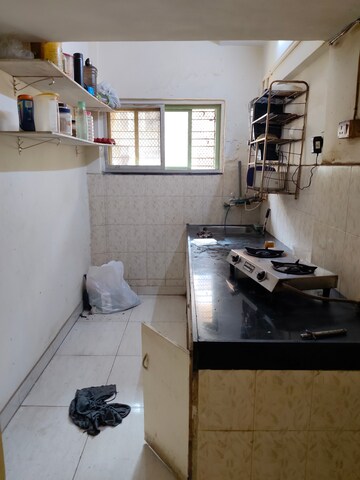 Kitchen in 2 BHK Apartment at Oshiwara Mhada, Andheri West – for Rent