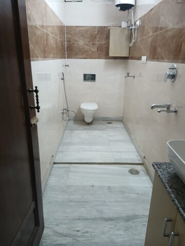 Bathroom in 2 BHK Builder Floor at Paschim Vihar – for Rent