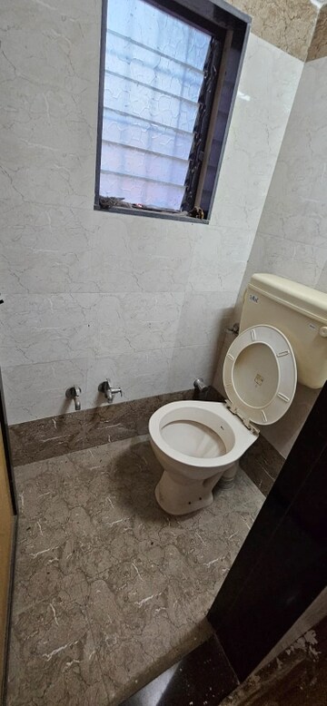 Bathroom in 3 BHK Apartment at Florence CHS, Santacruz East – for Sale