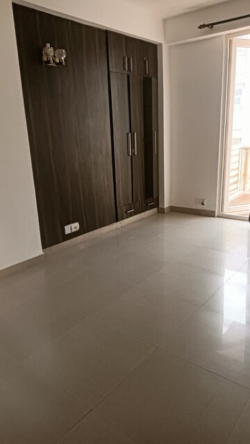 Room in 3 BHK Apartment at Tulip Petals, Sector 89 – for Rent