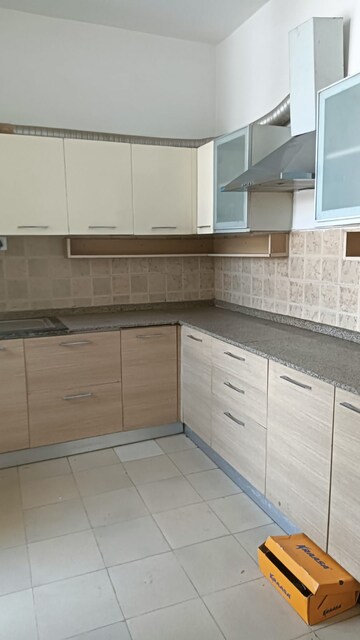 Kitchen in 3 BHK Apartment at Tulip Petals, Sector 89 – for Rent