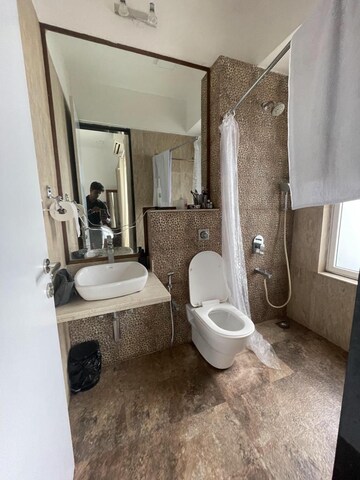 Bathroom in 2 BHK Apartment at Omkar Alta Monte, Malad East – for Rent