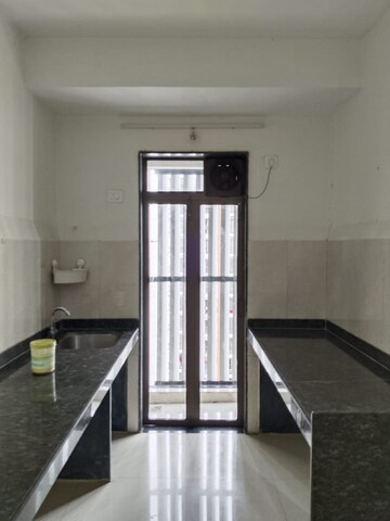 Kitchen in 1.5 BHK Apartment at Runwal My City, Dombivli East – for Rent