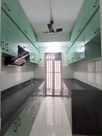 Kitchen in 3 BHK Apartment at Runwal My City, Dombivli East – for Rent