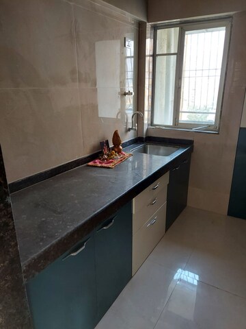 Kitchen in 1.5 BHK Apartment at Gautam Arcade, Kopri – for Rent