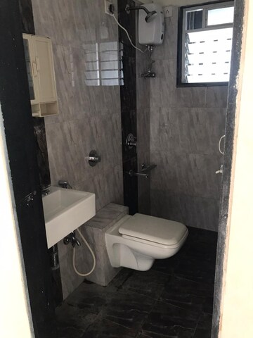 Bathroom in 2 BHK Apartment at Lotus Lotus Link Square, Malad West – for Rent