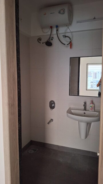 Bathroom in 2 BHK Apartment at Shree Venkatesh Graffiti Glover, Keshav Nagar – for Rent