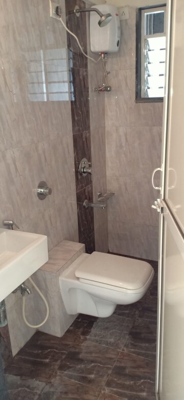 Bathroom in 2 BHK Apartment at Lotus Lotus Link Square, Malad West – for Rent