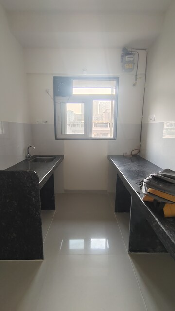 Kitchen in 1 BHK Apartment at Ashar Axis, Majiwada – for Rent