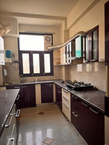 Kitchen in 3 BHK Apartment at SRS Residency, Sector 88 – for Rent