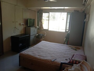 Living Room in 1 BHK Apartment at The Tenants CHS, Sion – for Rent