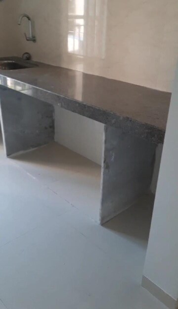 Kitchen in 1.5 BHK Apartment at Metropolis Aquaris Phase 1, Kasarvadavali – for Sale