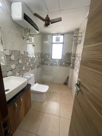 Bathroom in 3 BHK Builder Floor at Ansal Sushant Lok I, Sector 43 – for Rent