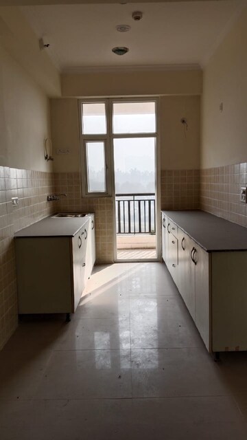 Kitchen in 3.5 BHK Apartment at Saviour Greenisle, Sain Vihar – for Sale