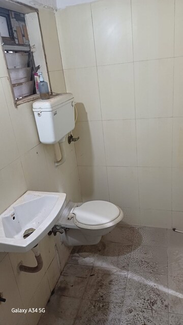 Bathroom in 3 BHK Apartment at Gaurav Woods Phase I, Mira Road – for Rent