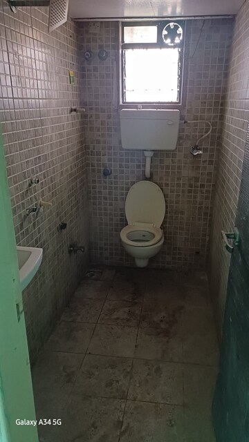 Bathroom in 3 BHK Apartment at Gaurav Woods Phase I, Mira Road – for Rent