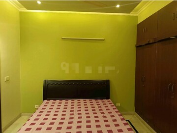 Bedroom in 2 BHK Builder Floor at RWA Apartments Sector 26, Sector 26 – for Rent