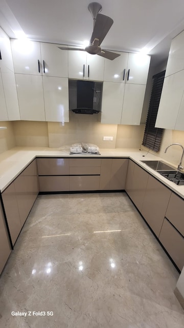 Kitchen in 3 BHK Builder Floor at Ansal Sushant Lok I, Sector 43 – for Sale