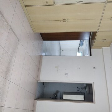 Kitchen in 3 BHK Apartment at DLF Exclusive Floors, Sector 53 – for Sale