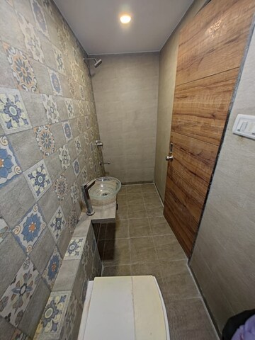 Bathroom in 2 BHK Apartment at Lovelita CHS, Juhu – for Rent