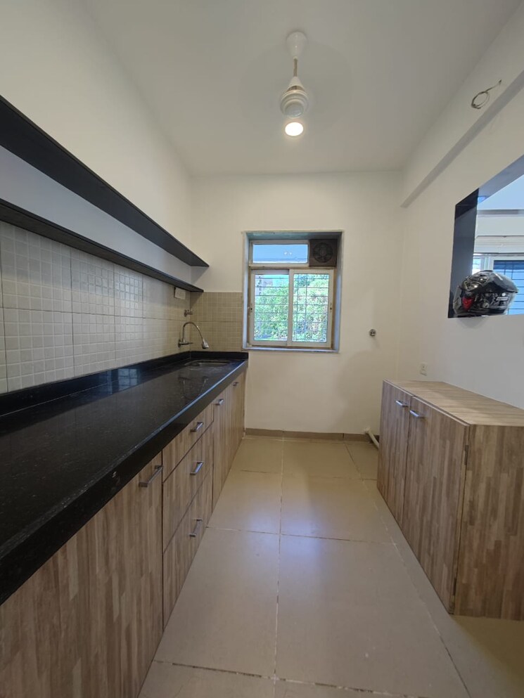 Kitchen, lovelita-chs 2 Bedroom 750 Sq.Ft. Apartment In Juhu Mumbai 8047013