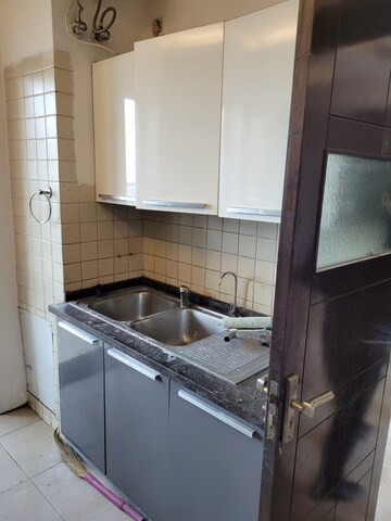 Kitchen in 4 BHK Apartment at Parsvnath Exotica, Sector 53 – for Sale