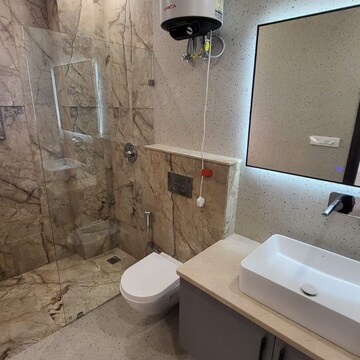 Bathroom in 3.5 BHK Builder Floor at Ansal Sushant Lok I, Sector 43 – for Sale