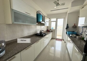 Kitchen in 4 BHK Apartment at Signature Global De Luxe DXP, Sector 37d – for Sale