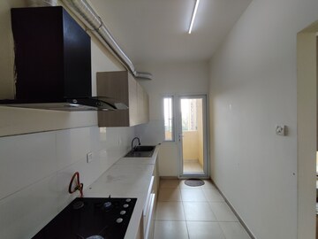 Kitchen in 2.5 BHK Apartment at Bhartiya Nikoo Homes, Thanisandra Main Road – for Rent