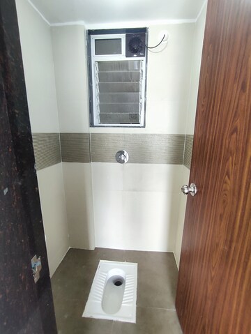 Bathroom in 1 BHK Apartment at Squarefeet Joy square, Kasarvadavali – for Rent