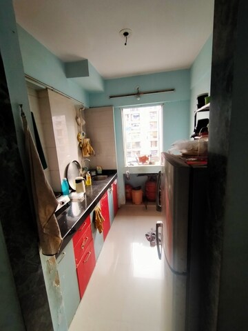 Kitchen in 1.5 BHK Apartment at Laxmi Avenue D Global City Ph-1, Virar West – for Sale