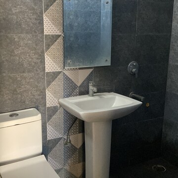 Bathroom in 3 BHK Apartment at Sushma Joynest ZRK, Ghazipur – for Rent